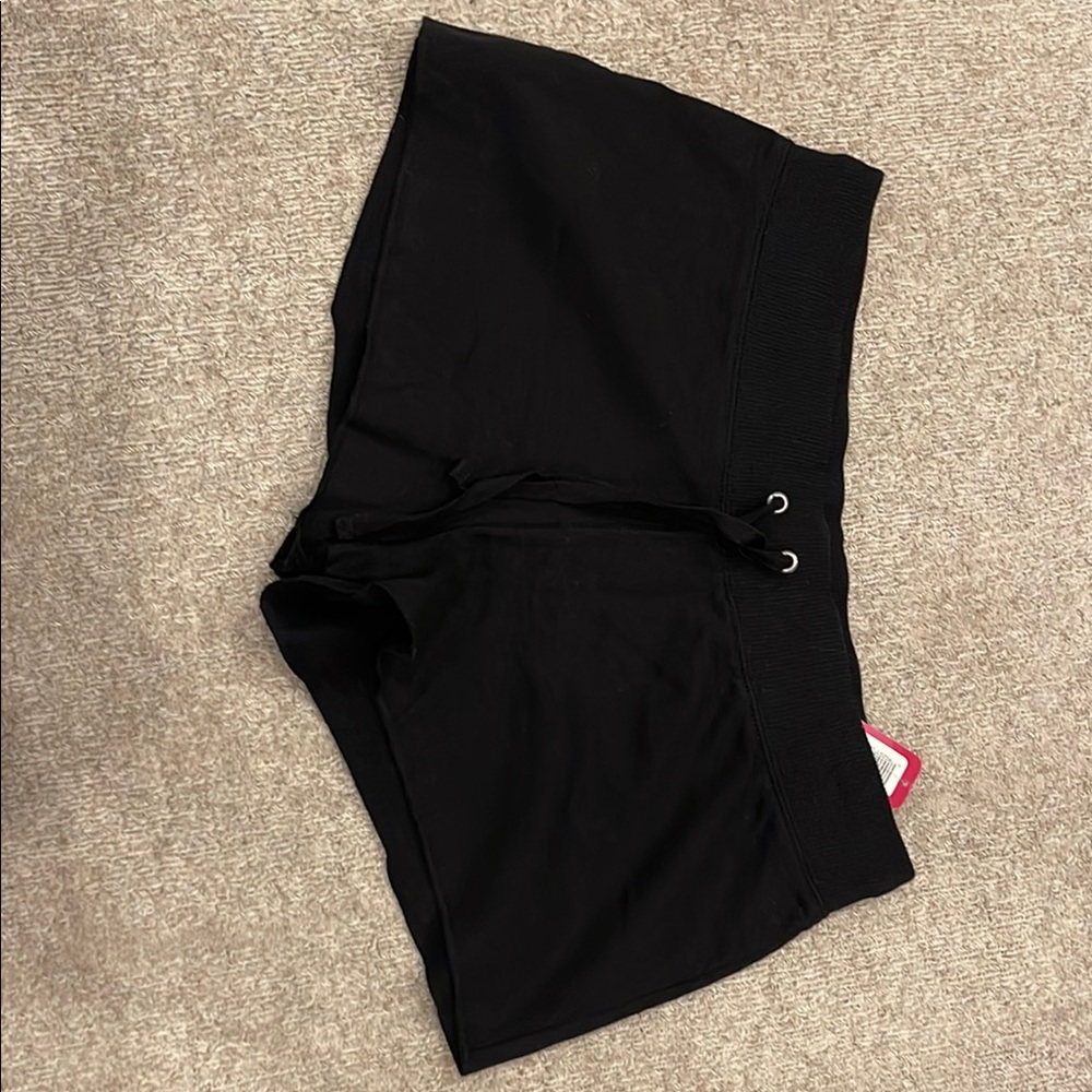 Women’s size small black cotton shorts.  New with tags.